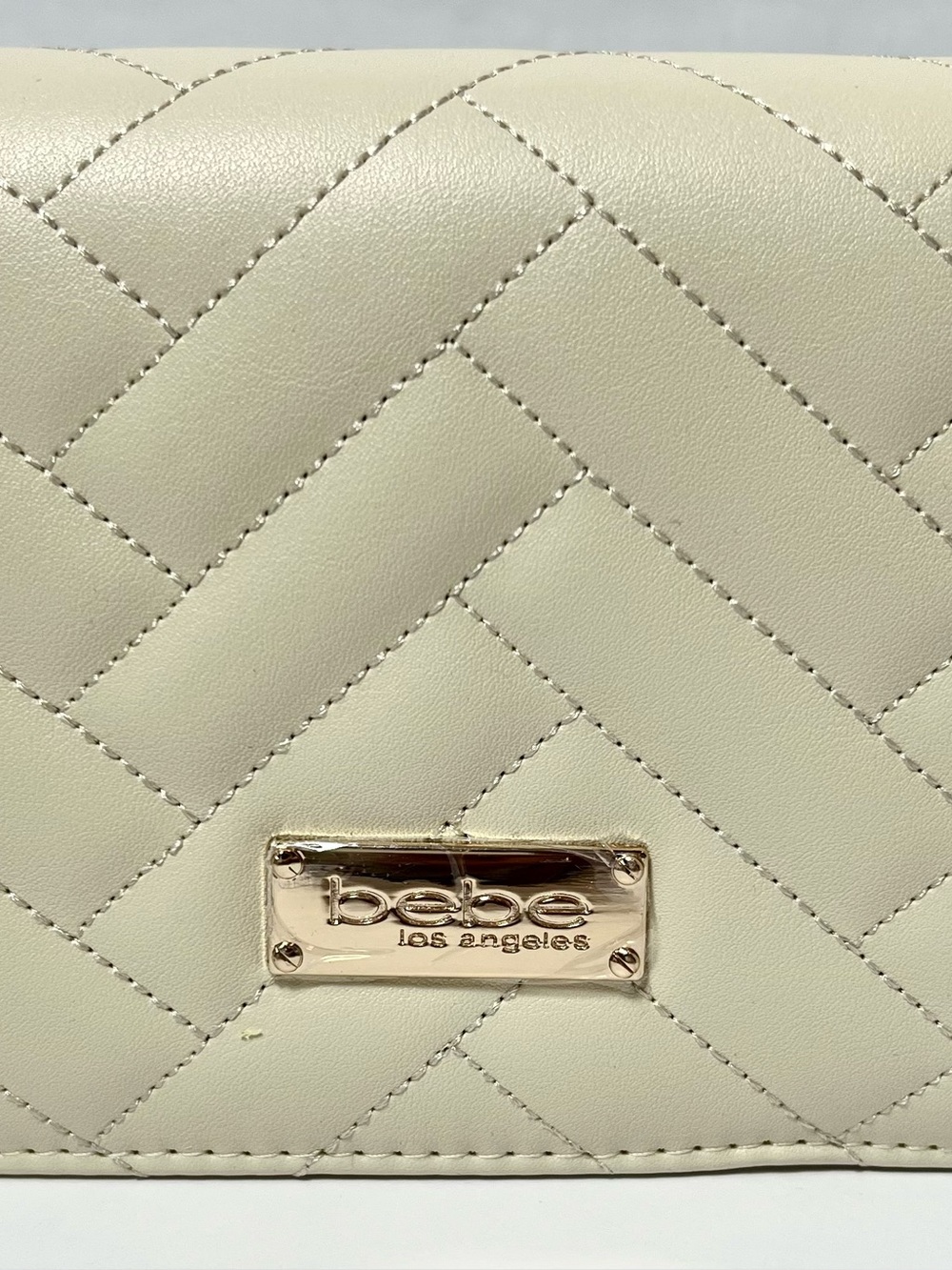 bebe Quilted Cream Crossbody with Gold Plate